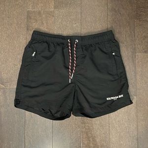 Black Kooples Bathing Suit with Reversed “The Kooples” Logo